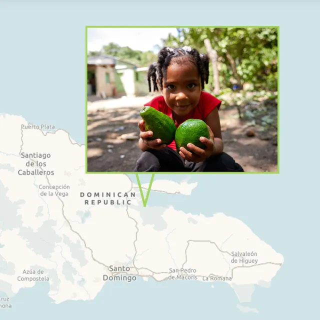 A child holding a piece of food