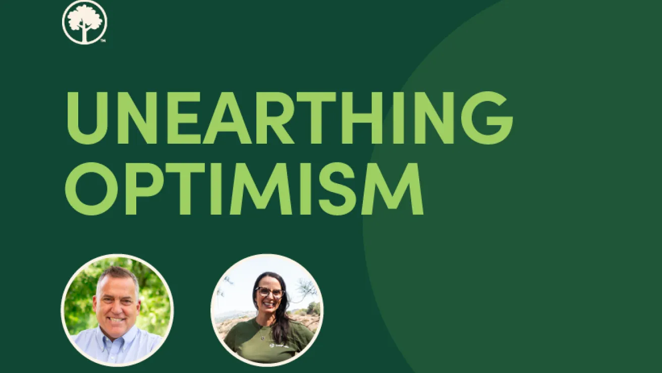 Graphic with “Unearthing Optimism” text, tree logo, and circular portraits of a man and woman on a dark green background.
