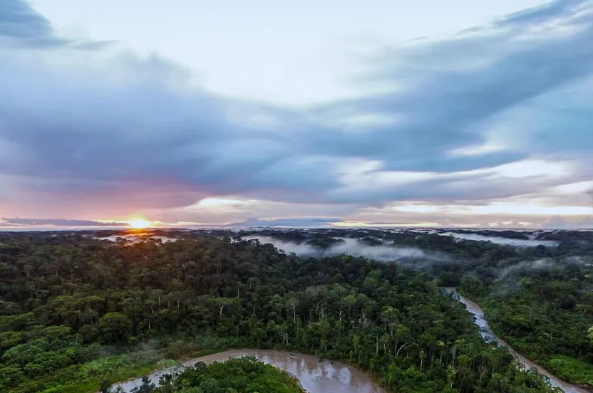 sunrise over amazon river basin